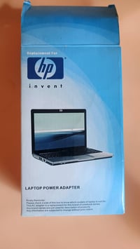 شاحن HP • ٦٥ واط • اصلية شغالة