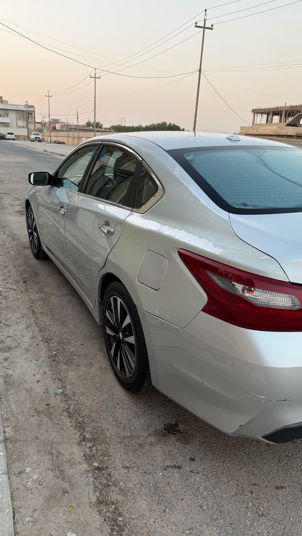 نيسان التيما 2018 رقم بصرة باسمي سياره وارد امريكي ضربتها خفيفه جاملغق خلفي وصبغ باب السائق محرك وكير كفاله بجم كبس ما مفتوح ماشيه 127 سعرها 110 رقم الهاتف ***********