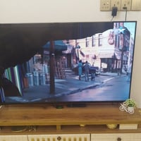 شاشه شينون • ٥٥ انش • فيها سواد