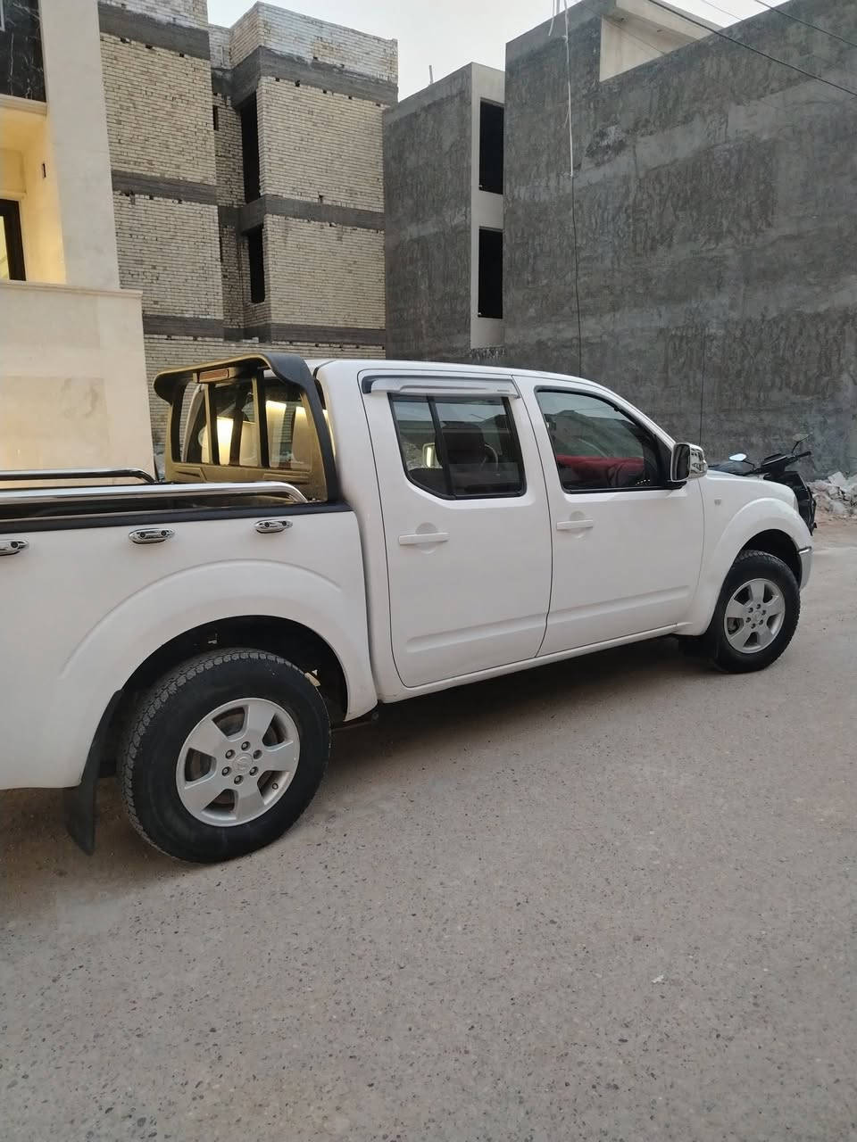 نيفاره ٢٠٠٩ مكفوله محرك بلادي كير عادي رقم دهوك السعر ٩٥ ورقه موبايل *********** العنوان بغداد
