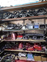 مجمع الأمريكي • السجن الإصلاحي • قطع غيار سيارات