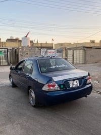 لانسر  بومه موديل 2007 رقم نكليزي نبار سياره مصبوغه حزام جماليه جاهزه ...