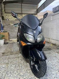 تي ماكس 2007 دراجه مكفوله مكينه كهربائيات   ماشيه 56 حقيقي   بيه كامره...