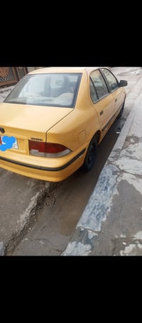 سمند ٢٠١١ • محرك و كير مكفول • رقم بغداد