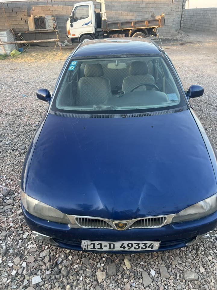 بروتون 
موديل2004 رقم بغداد أب اسمي 
السياره تخم تاير صدر جديد 

مكينه خير من الله 
تبريد شغال 
مصبوغه حزام 
جماليه بدون جراد مكاني واسط الحفريه 
***********
