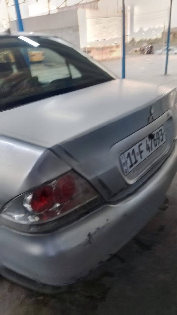 السلام عليكم عندي لانسر ٢٠٠٧ رقم بغداد بسمي السيارة مكفولة من ضربة او صبغ بس خشم الجاملغ لأيمن بية تصليح كير و محرك جيد جدا كهربائيات كل شغاله السعر ٦٨ وبية مجال حك الجية مكان السيارة في مدينة بسماية  ***********  بية وتس اب
