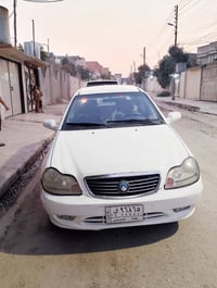 ٢٠١٣ • أبيض • تبديل يمين أمامي