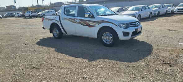 مسيوبيشي موديل 2015  L200 لبيع رقم بغداد جديد سياره جاهزه السعره 130 $ ***********
