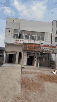 بناية استثمارية • مقابل كلية بلاد الرافدين • قاعة 90م