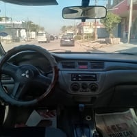 سيارة لانسر 2007مصبوقة عام .كير مكينة خير من الله تخم تاير حدادية  جدي...