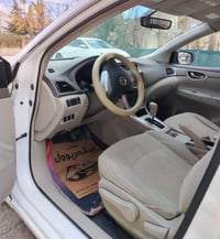 نیسان سێنترا 2016  خلیجی  مەکینە ۱٦  ڕەنگی سپی  سەنەوی و ڕەقەمی و ژینگ...