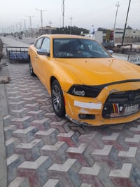 اخوان تشارجر 2014 للبيع باسمي 07714038006