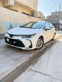 كورلا هايبرد مديل 2025 HEV رقم بغداد مشروع وطني بأسمي مكينه 1800 مكفول...