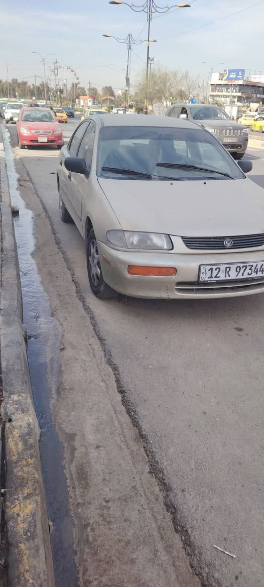 مازده موديل ٩٧ حجم 323 مكينه وكير حاويه شرط سنويه جديده رقم دولي شرط التحويل بيع او مراوس مع بيجو 306 مكاني موصل ***********
