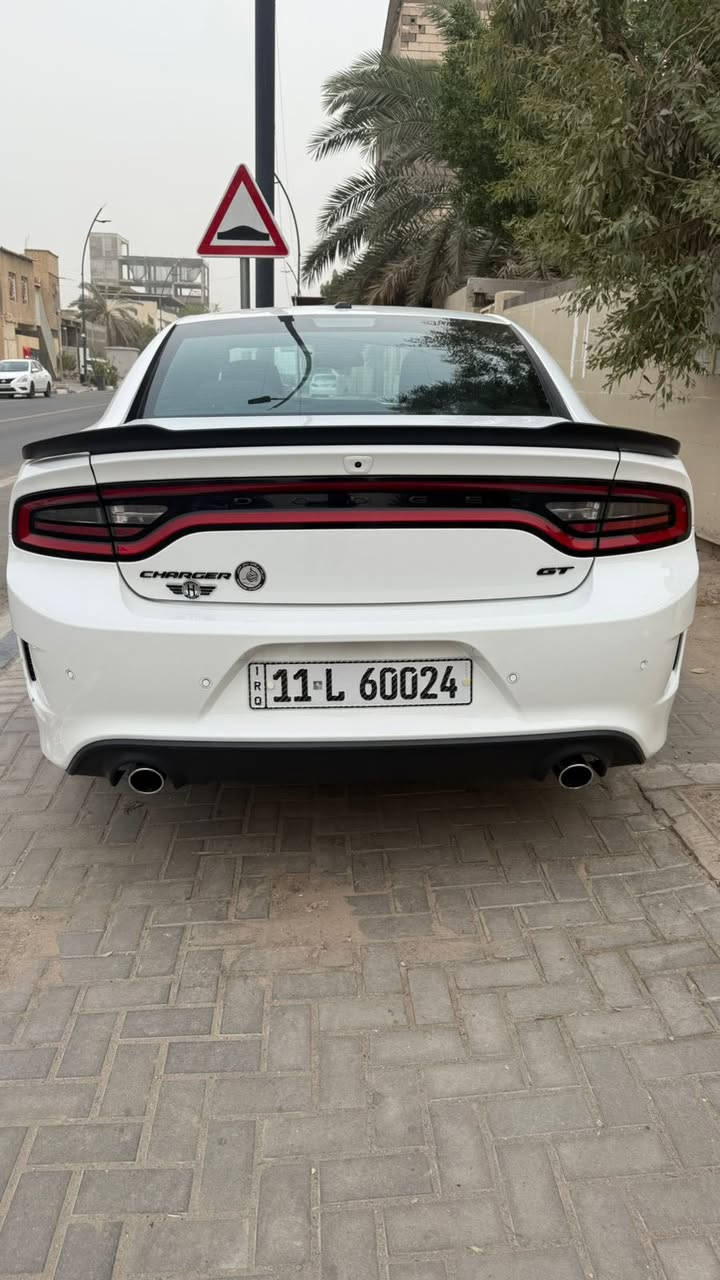 جارجر جي تي بلص بلاك أدشن 📍🩵
فول 1 /1 رادار جانبي مغلفة ppf
‏CHARGER GT PLUS BLACK EDITION 
لون  ابيض اخر اصدار لاس كول ؟
الموديل :2023 . (خليجي)  النداء الاخير. وكاله هارلم 
العداد : 15 ميل سياره بعده بحالت زيرو  
الضمان : 3 سنوات او 60 الف كيلو متر . 
المحرك : V6.  3.6L
مكفوله من الصبغ و التبديل و البارد و الشخوط 
مرقم بغداد الجديد كامل تحويل ثاني يوم 
المواصفات : رادار جانبي؟ 
* جناح خلفي اسود. 
* ويل قياس 20 انچ اسود . 
* مقود القيادة رياضي . 
* مقاعد رياضية من الشاموا الأسود.
* نقطة عمياء . 
رادار جانبي.
* مصابيح أمامية زنون . 
* كشافات الضباب زنون . 
* المصابيح الأمامية مع LED . 
* حساسات خلفية. 
* شاشه كبيرة مع نظام ملاحة نفكيشن GPS . 
* سستم صوت الپاين .
* فتحة سقف (سلايد) . 
* المقاعد الأمامية كهربائية . 
* ذاكرة لحفظ وضعيات الجلوس (ميموري) . 
* مقاعد أمامية تبريد وتدفئة . 
* مقاعد خلفية تدفئة.
* تشغيل عن بعد . 
* المقود كهربائي . 
* تدفئة مقود القيادة . 
* محدد سرعة . 
* تلفون بلوتوث . 
* كاميرا خلفية .
* مرايا متحسسة للاضاءة العالية .
* كير شفتر بالستيرن . 
* دخول ذكي (بصمة) .
السعر  💲 مغلف بي بي اف

رقمي ***********
مكاني بغداد
