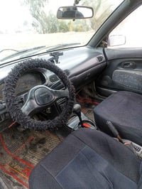 مازدا ١٢١ • سقف كشف • توماتيك