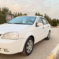 من رخصه ادمن عندي سياره اوبتره للبيع  كير مكينه صدر تبريد تدفئه مكفولا...