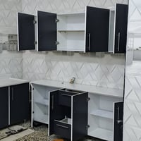 كاونتر ( ام دي اف تركي خشب  )  قياس مترين مع سنك متر ونص مستخدم شهر مس...