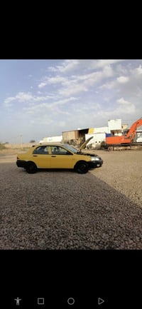 لانسر صفراء • ٢٠٠٩ • مكينة ٢٠٠٠