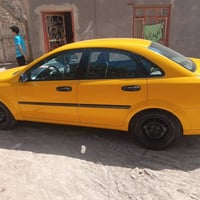 فورنزا 2008 سياره بأسمي رقم ذي قار سنويه ل2030 مكينه جديده لاتنقيص ولا...