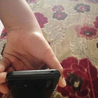بوكو ام خمسه • شغال • شاشة مكسورة