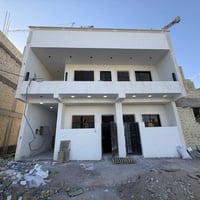 للبيع عمارة حديثة في مجمع الضباط السكني – قرب مطار بغداد الدولي وخلف ج...