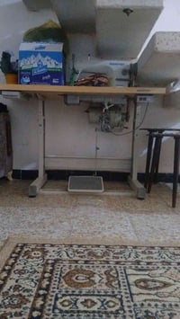 مكينة خياطة • رجالية • قابلة للتفاوض