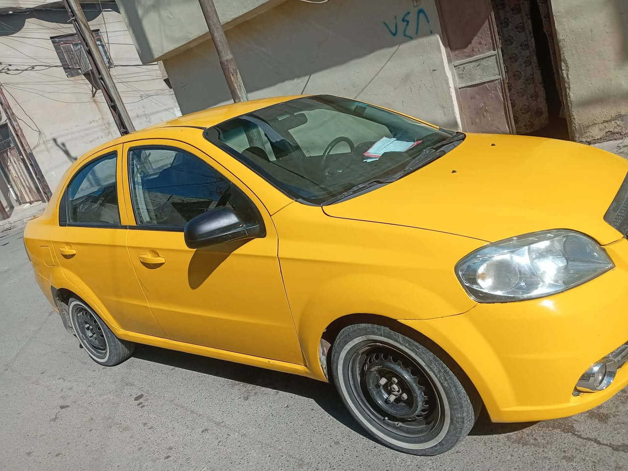 افيو موديل 2009 رقم نينوى بسمي جديد هزه جديده گير محرك شرط بدون ضرر بيها طخه بصيطه  بل صندوق وتلكيطات معجون ما تكسي كير عادي السعر 57 وبيها مجال قليل رقم الهاتف ***********
