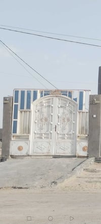 باب خارجي • عرض ٣م • ارتفاع ٢٦٠سم