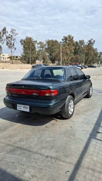 كيا سيفيا • ١٩٩٦ • كويسينجاك