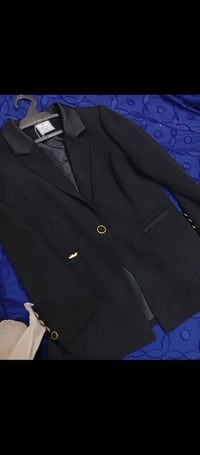 سترة • قياس ٥٠ • ملبوسة