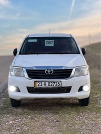 هايلوكس ٢٠١٢ • أسود • غاز وبنزين