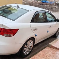 سيارة سيراتو 2011 فول موصفات سلايت  تحكم سرعه  5 تايرات ويلگب مع السبي...