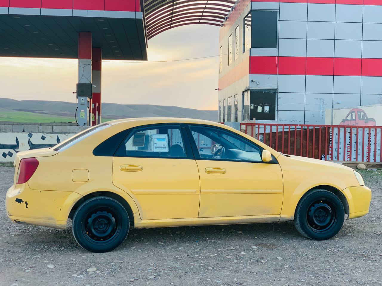 ئۆپترا2012ئۆتۆمایتک ئۆتۆماتیک
ڕەقەم بەغداد تەنیا ئەوەلیاتە
سەنەوی ئەسڵ بەشەرتی ئەوەلیات
دوای و پێش و سەقف و شان هیچی پێوەنیە
قەترە مەعجونی نیە
گێڕ و مەکینەی بەشەرتی فیتەر
چوارتایەیی لۆک
تەبرید ئیشەکا
کارەبایی ئیشەکا ناو دەژبول و گێچ بەنزین 
سەیارەکە زۆر زۆر پاک ماوەتەوە
ماڵی کاسبیە
لەچەمچەماڵم***********
***********
