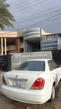 نيسان سني اصل ياباني قبغ اسود موديل 2005 مصبوغه حزام حادثهه جاملغ وباب...