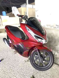 للبيع pcx جيل ثالث ماليزي الدراجة جديدة مكفولة مابيهة اي نقص مكاني بغد...