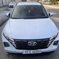 توسان لون ابيض موديل 2022 وارد امريكي فول مواصفات  فتحه  بصمه سايد بري...