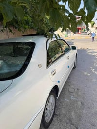٢٠٠٣ • سقف زجاجي • هايدروليك جديد