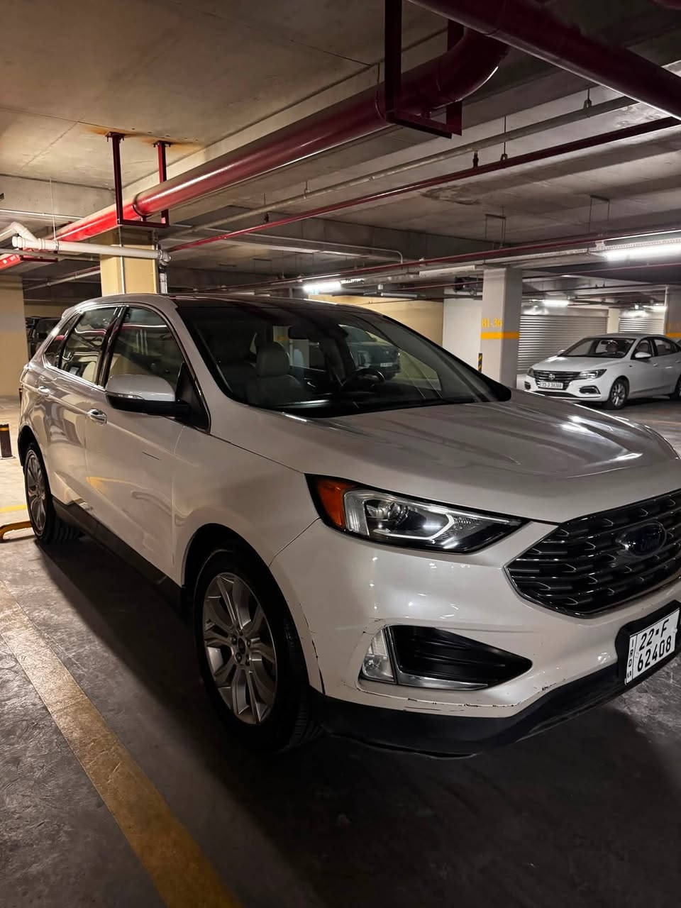 السلام عليكم شباب.. فورد إيدج تيتانيوم 2019 (Ford Edge Titanium) للبيع

أعلى مواصفات بالفورد (Titanium)، عزل وفخامة ومتانة ومتعة بالسياقة.

📌 تفاصيل السيارة:
 الموديل: 2019.
 المحرك: 2.0L EcoBoost تيربو .
 المسافة المقطوعة: 65,200 كم (ممشى حقيقي).
 وارد كندي.
 اللون: خارجي أبيض / داخلي جلد أبيض.

🛠️ حالة البودي والصبغ:
 السيارة بدون صبغ نهائياً.
 بيها بعض الرصعات والخدوش البسيطة الموضحة بالصور، وكلها تتصلح (على البارد) وترجع لوكالة بدون أي مشكلة.
 تقرير السونار وفحص السيارة مرفق وية الصور بالمنشور لضمان الشفافية.

⭐ أبرز مواصفات فئة التيتانيوم (Full Options):
 بصمة تشغيل وبصمة أبواب + تشغيل عن بعد.
 شاشة تدعم Apple CarPlay و Android Auto.
 نظام صوتي بريميوم فاخر من شركة B&O (Bang & Olufsen) العالمية صوت بنقاوة وفخامة عالية جداً.
 كراسي جلد كهرباء (تدفئة) + ذاكرة لخزن وضعيات الجلوس (Memory Seat) ستيرن تدفئة.

 أنظمة الأمان: رادار جانبي (نقطة عمياء)، نظام تحديد المسار.
 إضاءة داخلية محيطية (Ambient Lighting) بألوان متعددة.
 لايتات LED تفاعلية ذكية + ويل كروم حجم كبير بلادي خاص بالتيتانيوم.
 التبريد قطعتين ثلج ما شاء الله، وصدر السيارة وجاهزيتها 100%.

💵 السعر المطلوب: ١٥٧ ورقة وبيه مجال بسيط
📜 السنوية والتحويل: السنوية جديدة بأسمي والتحويل ثاني يوم
📍 مكان السيارة: أربيل 
📞 للاستفسار والاتصال: ***********
