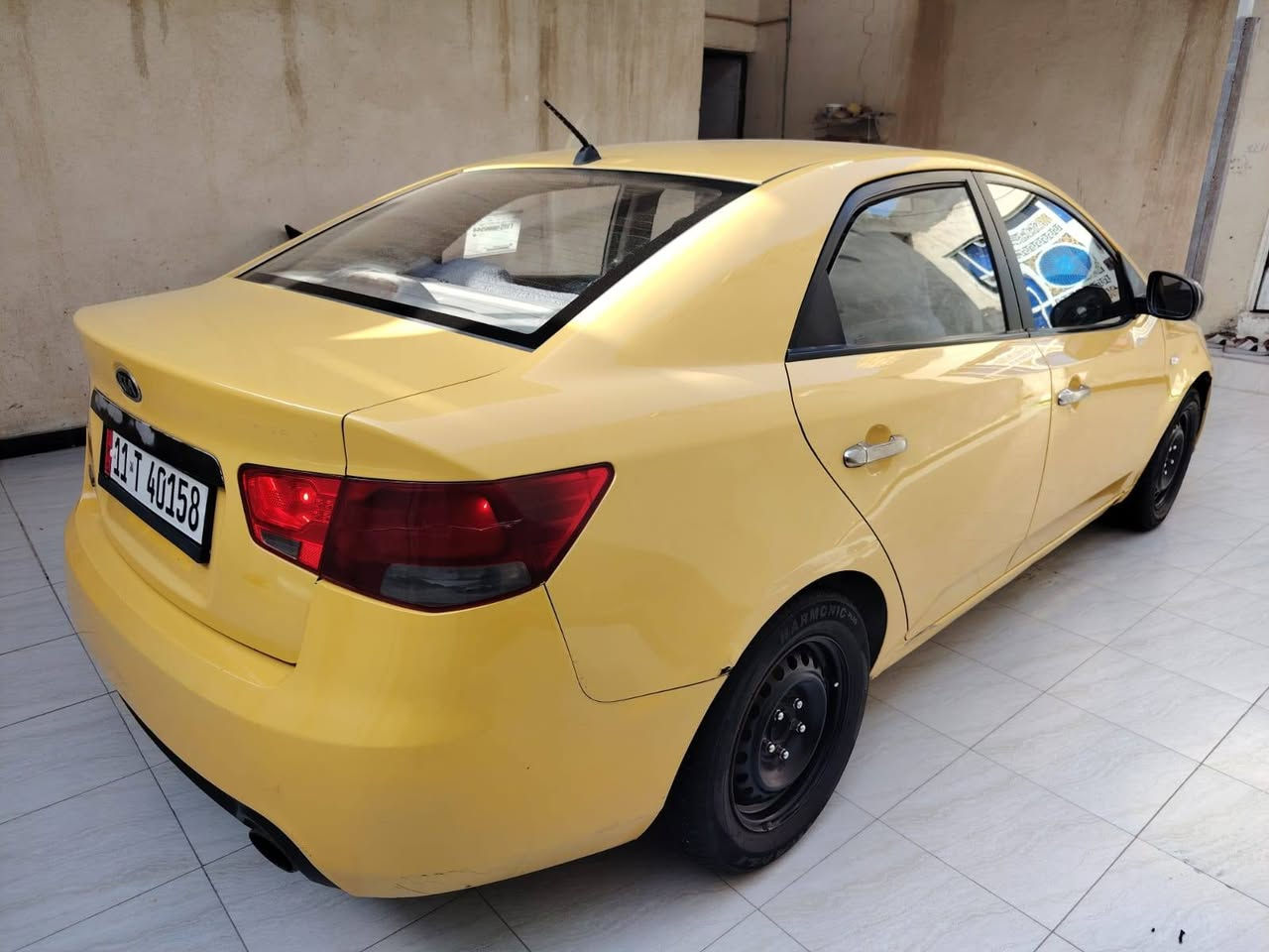 السلام عليكم كيا فورتي وارد أمريكي موديل 2011 حره تحويل ثاني يوم مشروع وطني سنويه ل 30 هزه جديده رقم بغداد بسمي مكفوله من الضربه والتبديل كير ومكينه وحداديه وتبريد تدفئه اربع تايرات جديدات دواخل جدد صبغه جديده مصفره هيئه وغرامات خط وبحث جوال ترايه كلش حلو السعر 80 مكان السيارة الناصريه مدينه الصدر التصال ***********
