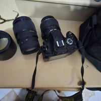 كاميرا نيكون • كاميرا 5100D • نيكون D5100 • عدسة كاميرا • شاحن كاميرا ...