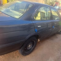 نيسان صني • ٢٠٠٠ • سنتر لوك