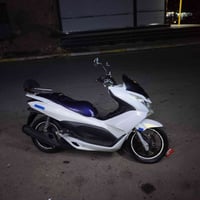 PCX جيل أول • كفالة عامة • زنون ابيض