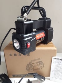 جديد غير مستعمل بالباكيت منفاخ اطارات السيارة يعمل على جداحه السياره ب...