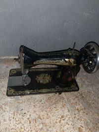 مكينة خياطة • شرط • ناقص عيار