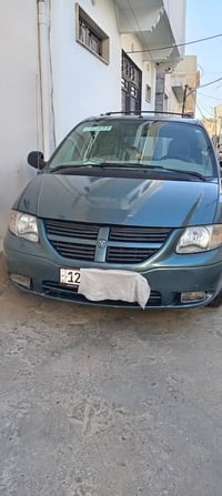 سياره دوج كرفان توماتيك موديل 2007 شرط مكينه وكير وكهربائيات بشرط وسنو...