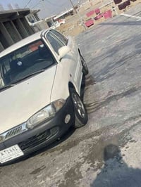 بروتون للبيع الموديل ٢٠٠٤ كير اوتو لون ابيض السياره محركهة خير من الله...