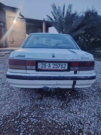 سياره مازده 626 موديل91 كابرته گير عادي رقمهة نجف مشروع وطني  شرط التح...