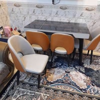 ميز طعام مرمر للبيع وياه ٤ كراسي نظيف سعر ١٥٠ الف بغداد الغزاليه ٠٧٩٠٥...