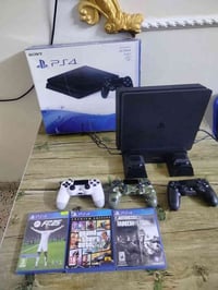 بلي فور سلم ياباني نص تيرا جهاز مامفتوح  وقاعدة شحن مع 3 يدات مع 4 أقر...